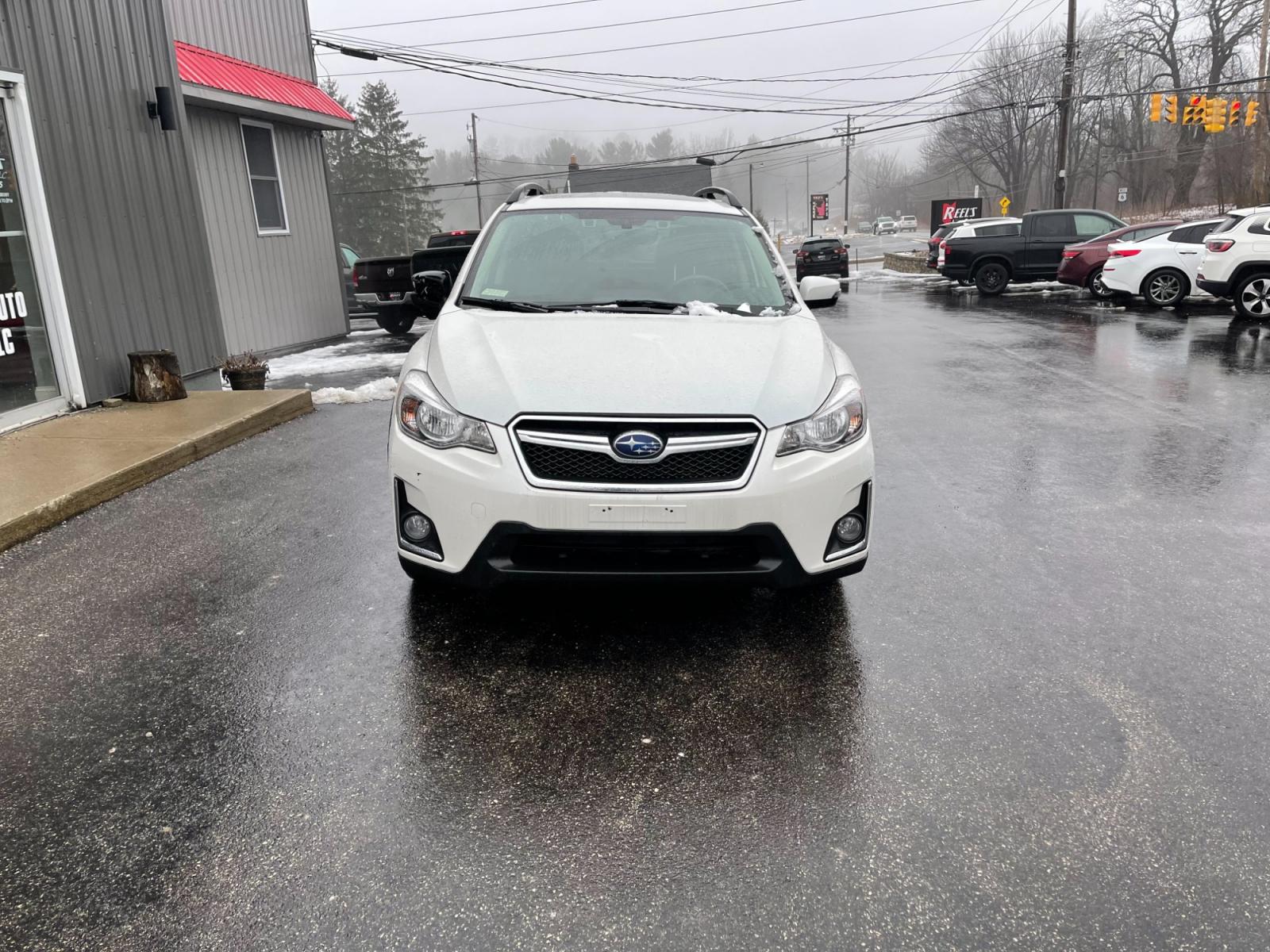 2017 White /Black Subaru Crosstrek 2.0i Limited PZEV CVT (JF2GPANC4HH) with an 2.0L I4 DOHC 16V engine, Automatic transmission, located at 11115 Chardon Rd. , Chardon, OH, 44024, (440) 214-9705, 41.580246, -81.241943 - This 2017 Subaru Crosstrek 2.0i Limited with CVT (Continuously Variable Transmission) offers a luxurious and safe driving experience. It features a leather interior, heated seats, and convenient technology such as navigation and a backup camera. A power moonroof brings a touch of the outdoors inside - Photo #1